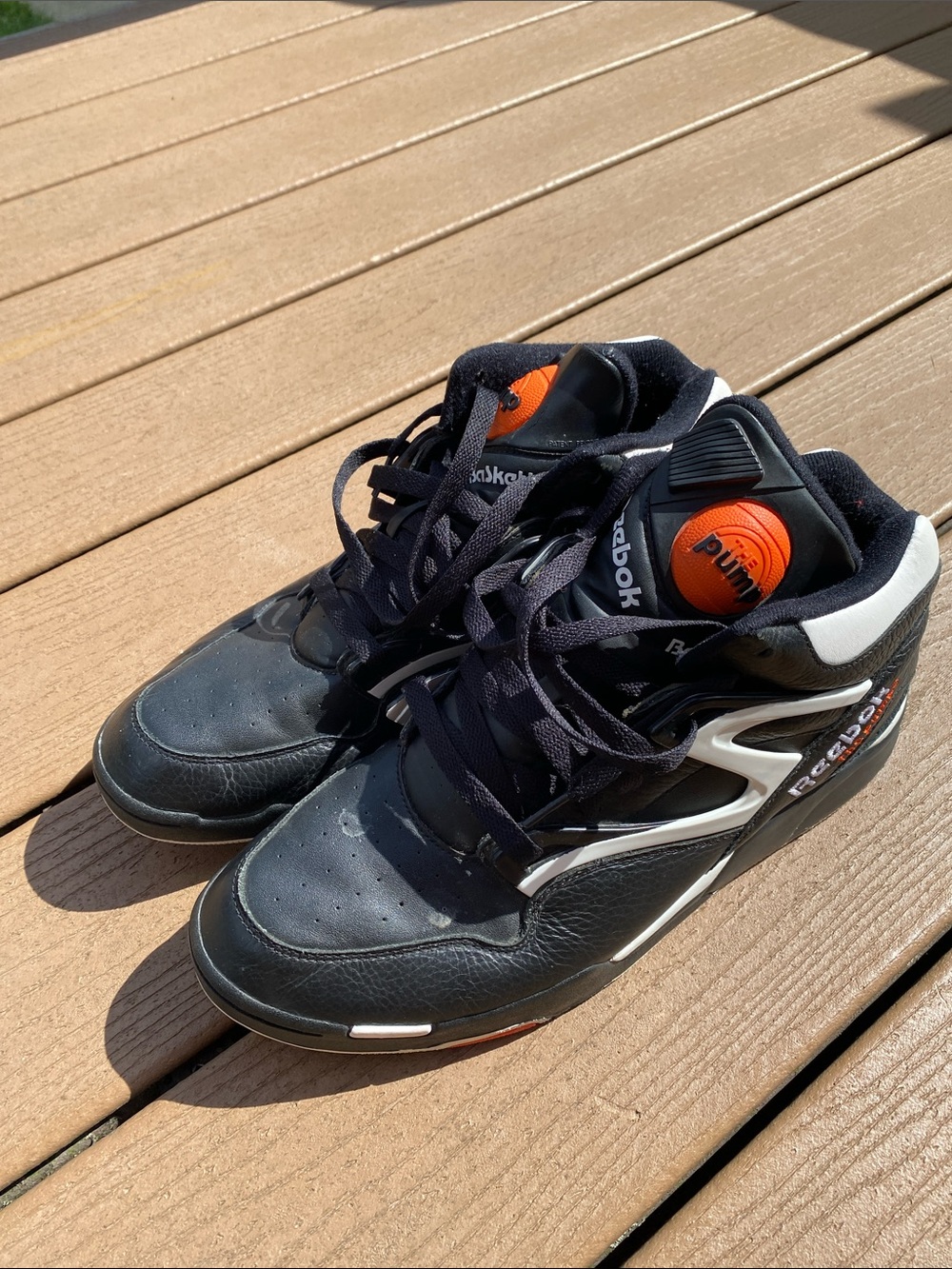 Reebok Men’s Black and White Sneakers with Orange Accents